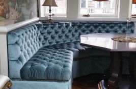 Fabulous blue velvet tufted kitchen banquette created by Bespoke for Maison De Papillon 