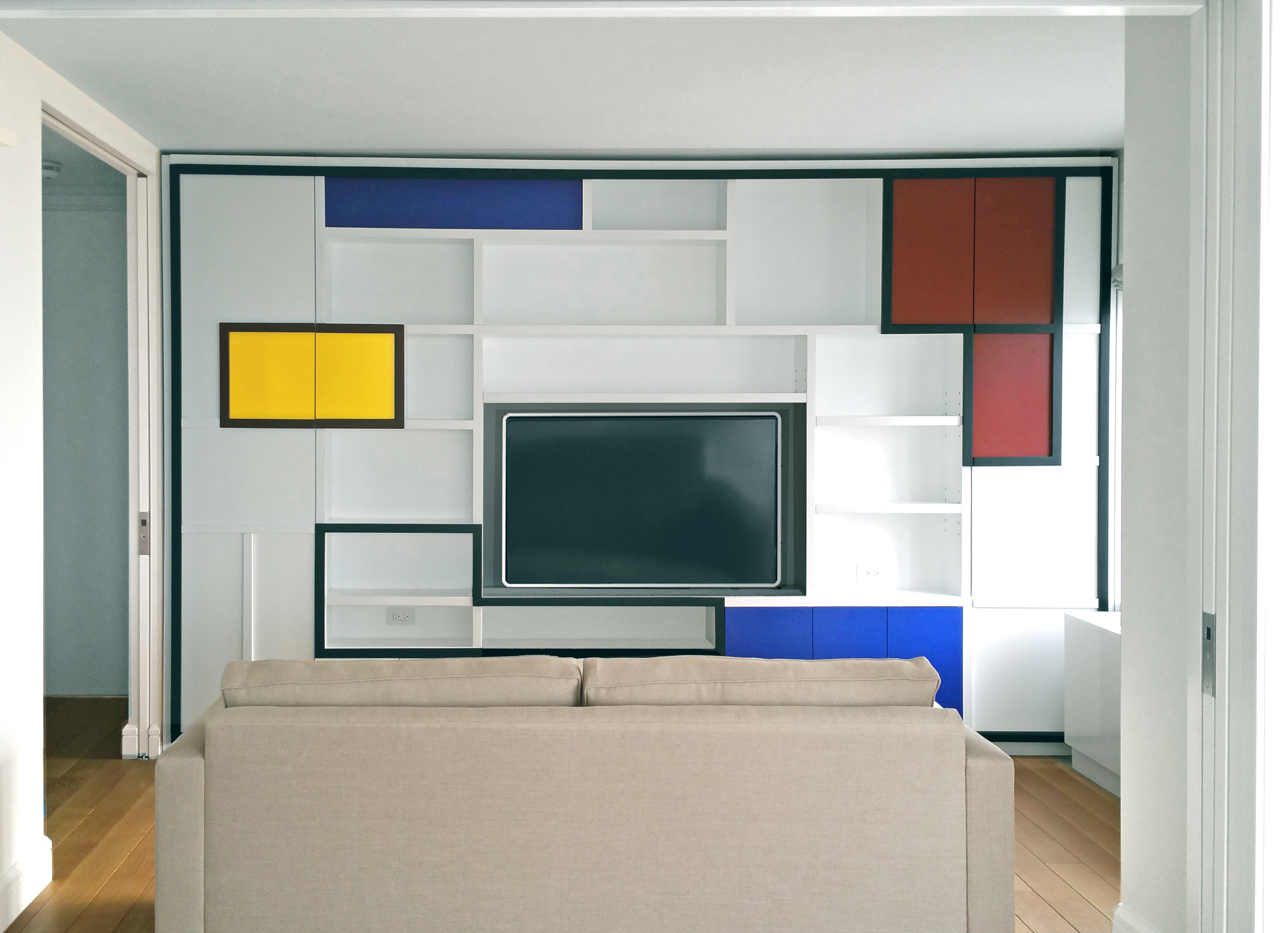 Custom sofa and entertainment system inspired by Piet Mondrian by Bespoke by Luigi Gentile