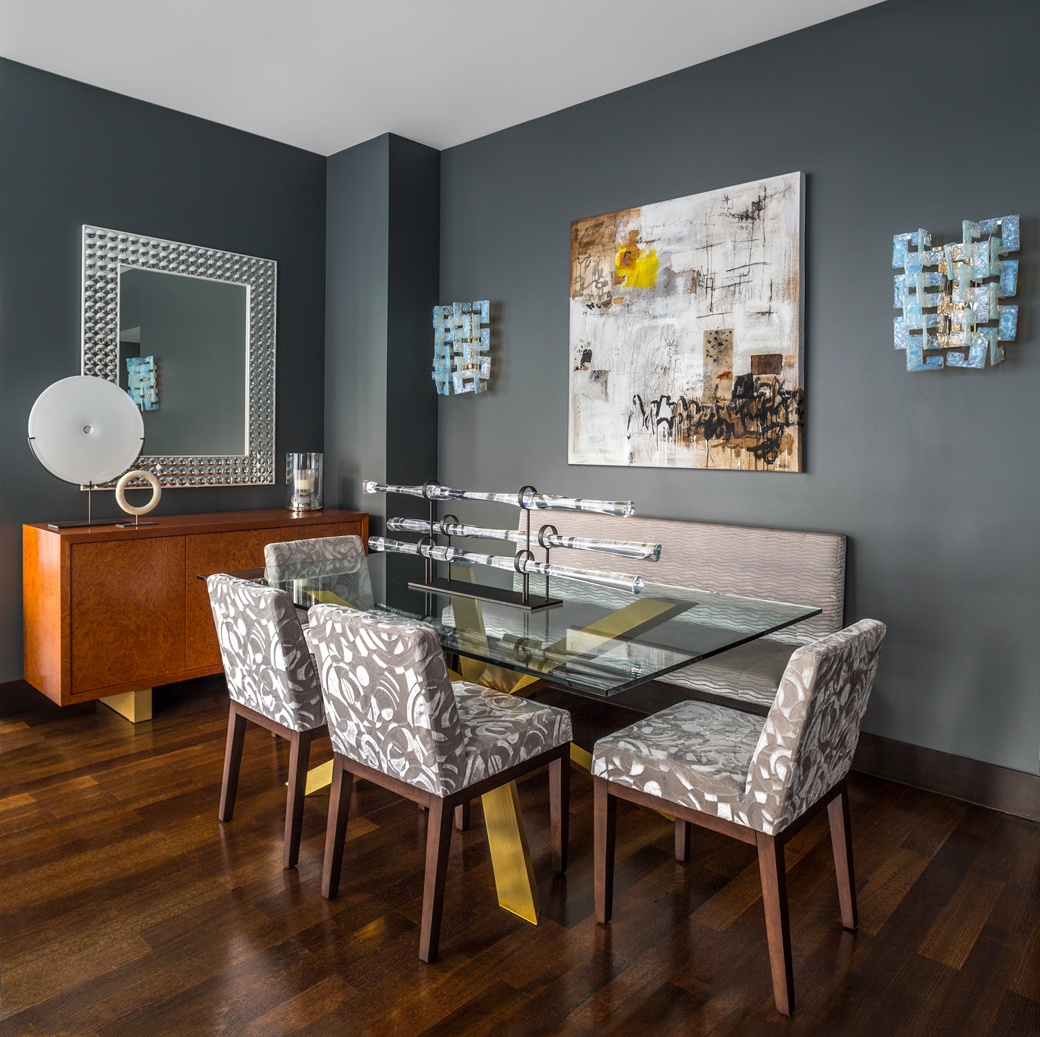 Custom upholstered dining chairs and banquette with solid walnut legs by Bespoke by Luigi Gentile