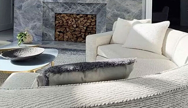 Close-up of back of curved sofa.