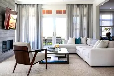 The Carson sectional sofa features clean modern lines, deep plush cushions, and versatile comfort, perfect for contemporary living.