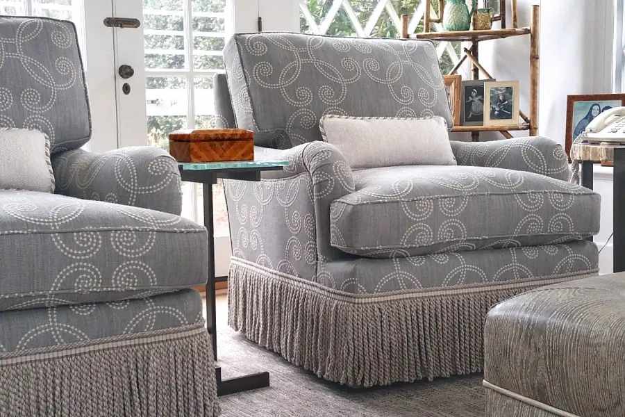 Enchanting Hamptons getaway, featuring our custom upholstered Bleeker Bridgewater club chair with a swivel base and traditional style.