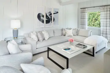 Custom upholstered left arm facing, Beekman L Shape sectional sofa with rustic grey wooden details.