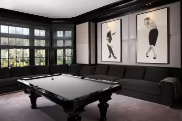 Our Beekman sectional with built in table, wraps all around this sensational billiard room. Lovery design by Michelle Gerson!