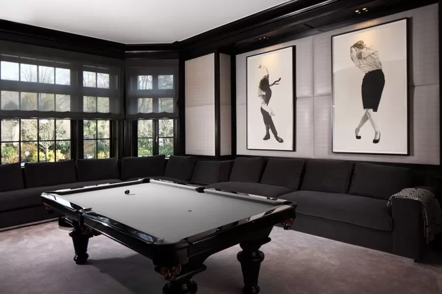 Our Beekman sectional with built in table, wraps all around this sensational billiard room. Lovery design by Michelle Gerson!