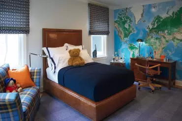 Fun kid room with our custom leather upholstered bed. Nail head trim add a hint of masculinity to a brilliantly executed room. 