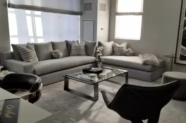 The Beekman sectional features sleek modern lines, plush seating and oversized cushions, offering luxurious comfort and understated elegance