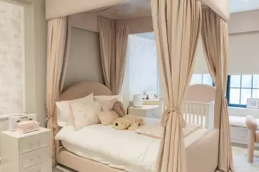 A dreamy young girl\'s bedroom featuring our Bespoke four-poster bed with baldachin. How fun!