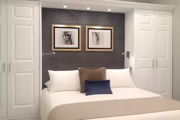 Sophisticated comfort and fantastic use of space in this elegant horizontally channelled bed flanked by our custom cabinetry. The side cubbies with the reading lights add to the versatility of the design.