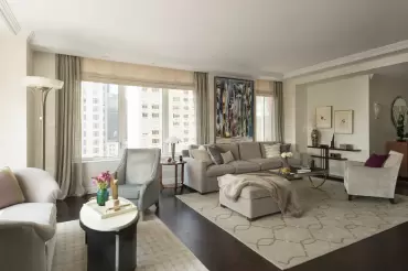 The four-seat Chelsea sofa showcases sleek lines, plush cushions, and timeless elegance, offering versatile comfort and sophistication.