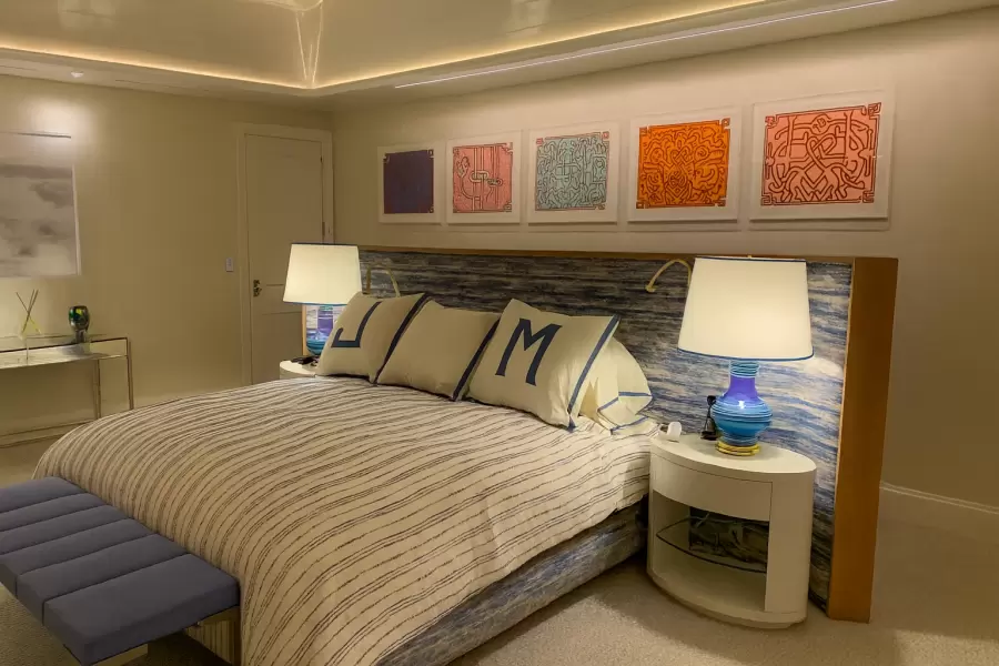 Wood trim, soft channeled upholstery, built in reading lights make this free standing bed a natural choice for the comfort minded individual