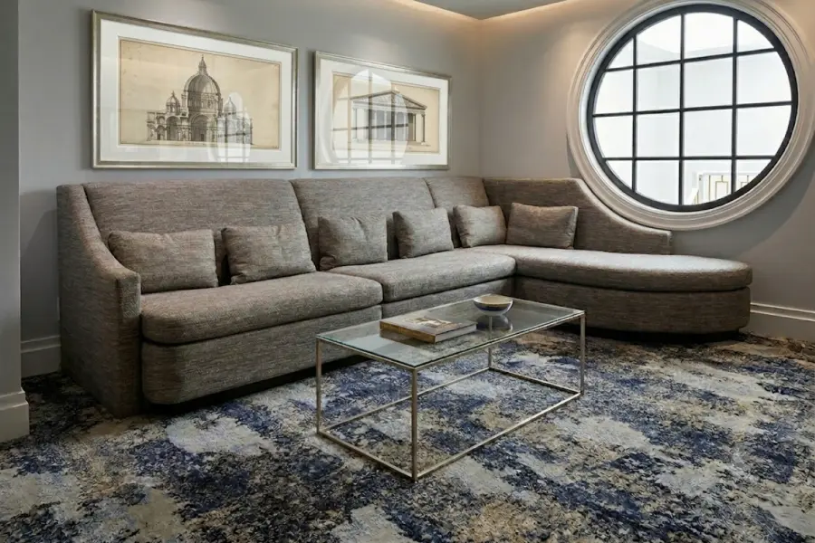 Our custom dual twin sofabed made to fit perfectly around the existing porthole window frame