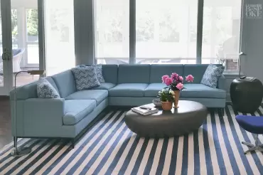 A fantastic use of our Greenwich sofa style. Here shown as a sectional with a custom tight back