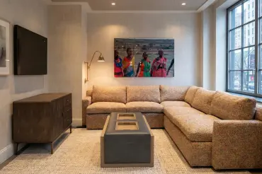 Corbin Ottoman Table in a cozy and modern  den in Manhattan. 