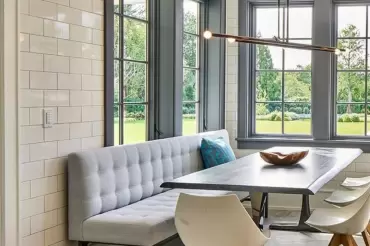 Custom mda Meeker banquette makes a statement in this modern and industrial kitchen. Dining comfort and style without compromise.