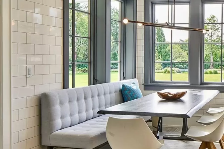 Custom mda Meeker banquette makes a statement in this modern and industrial kitchen. Dining comfort and style without compromise.