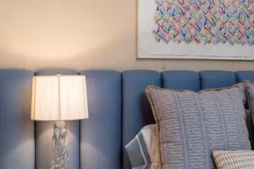 Wall to wall headboard with deep channeled upholstery. A visually imposing re-interpretation of our Tiramisu bed by Penny Drue Baird